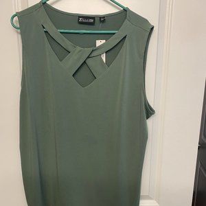 Green top criss cross neck. No Sleeves.